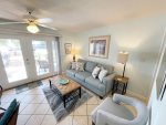 Comfortable living room opens to ground floor patio. Just steps to the Beach  